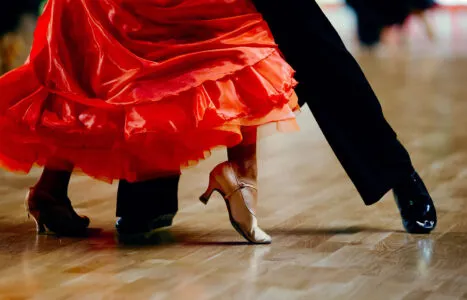 dance sports couple red dress black suit tail